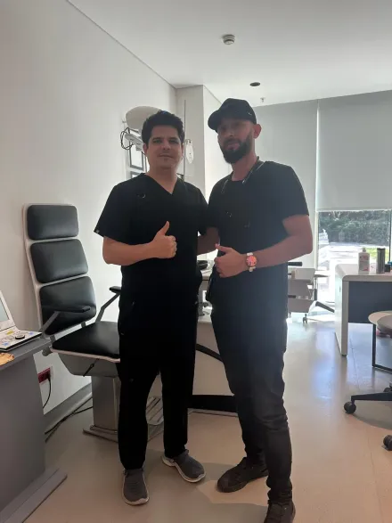 A patient with his coordinator after a consultation at the eye clinic in Istanbul