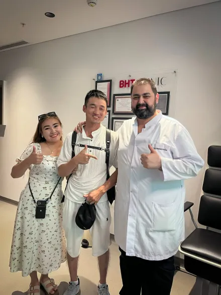 An international patient with his surgeon and coordinator after eye treatment in Istanbul